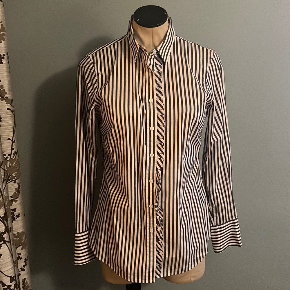 Structured button down with ruffle placket!